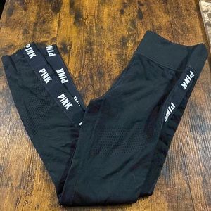 PINK leggings. Color: black. PINK written down both legs in white.Size US small.
